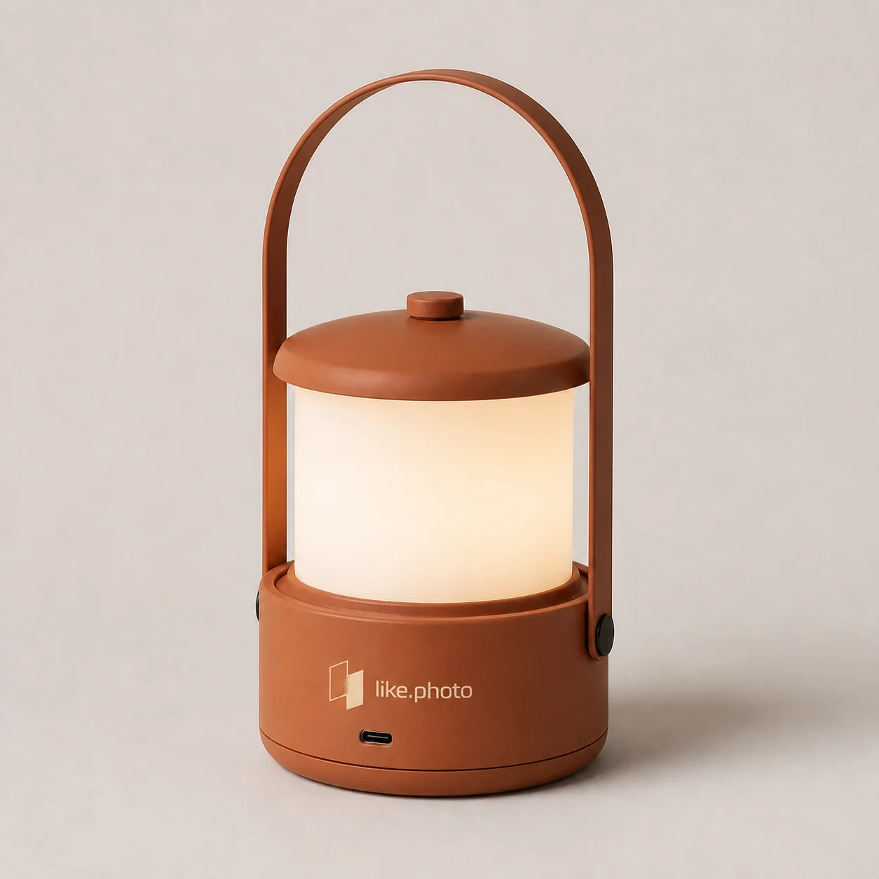 Terracotta Luma table lamp against a light background, used as the source image