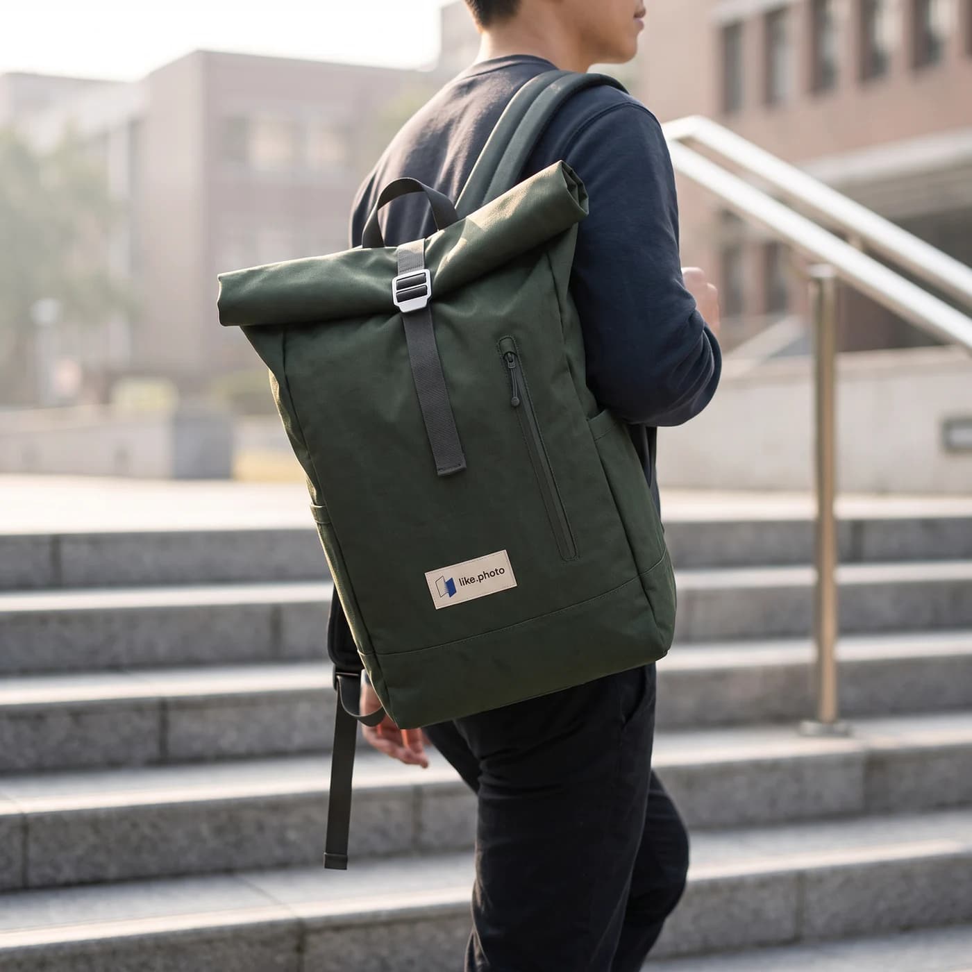Accepted lifestyle image: Rove backpack over a person's shoulder on a staircase